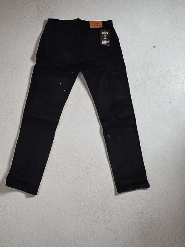 Blue jeans with white patches
