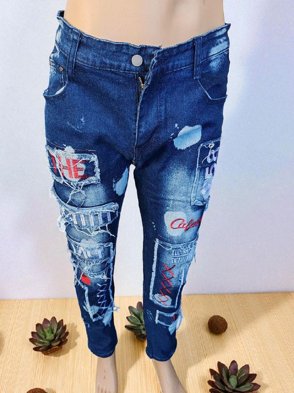Blue jeans with patches and branding