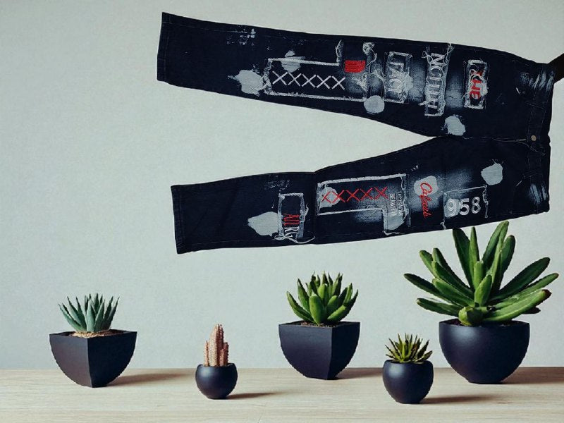 Black scarf with graphic design draped