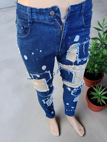 Distressed blue jeans